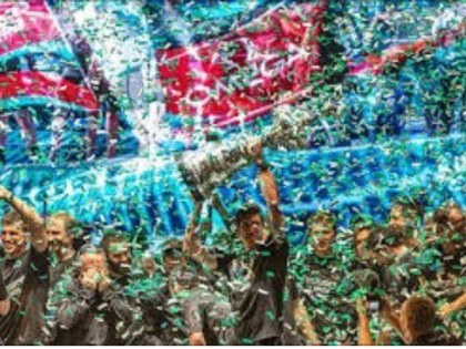 Máquina de confeti profesional en funcionamiento durante evento Eutópica