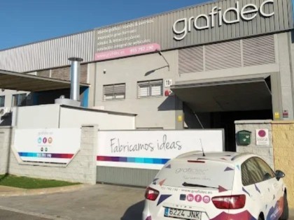 Zona expositiva decorada por Grafidec en evento profesional en Andalucía