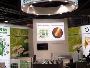 Stand assembly with Bluetooth coverage for sending mobile promotions