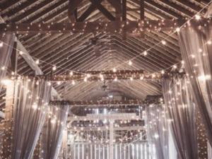 Rustic chairs and tables rented for an anniversary celebration in Malaga