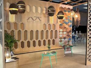 Sustainable festival setting with cardboard structures and energy-efficient LED lights