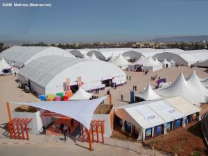 Food court at a local fair equipped with furniture and mobile enclosures